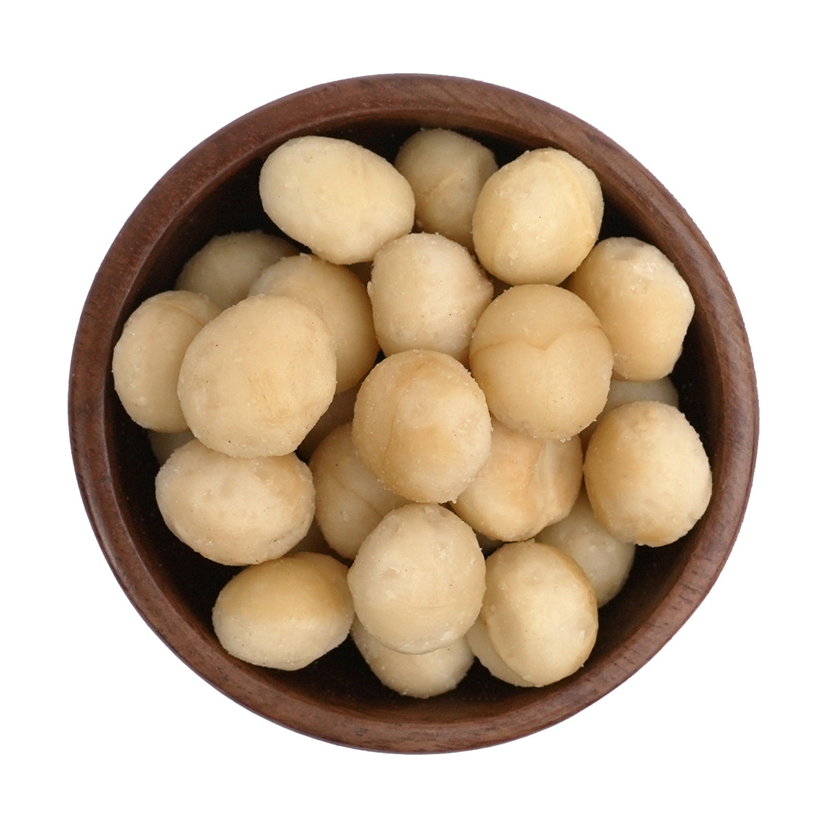 geröstete und gesalzene Macadamia in Holzschale